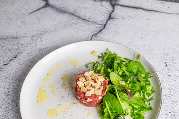 Beef Carpaccio cold appetizer with parmesan