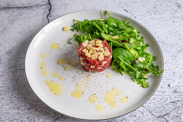 Beef Carpaccio cold appetizer with parmesan