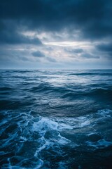 Fototapeta premium A serene ocean horizon at sunrise, embodying a sense of hope and healing. Perfect for wellness and relaxation themes.