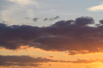 Soft pastel cloudscape at sunset, muted peach and lavender tones, wispy high clouds, tranquil atmosphere, minimal composition, ideal for wellness and calm branding