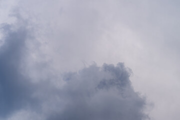Fototapeta premium Subtle and Beautiful Cloud Patterns Displayed in Soft Gray Skies Above the Horizon