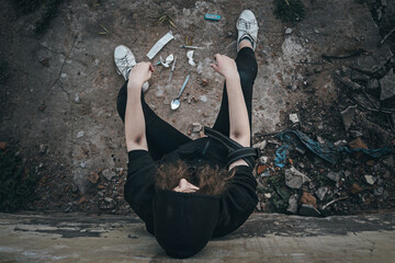 A young woman suffering from heroin overdose, depicting the severe consequences and tragedy of drug addiction in a gritty, realistic style for anti-drug campaigns.