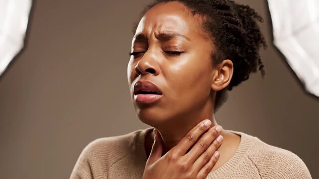 A Woman's Distress: Cinematic Close-Up with Expressions of Pain and Discomfort