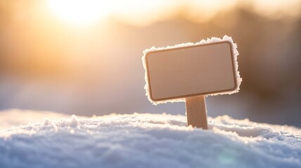 Blank winter sign beckons in the snowy landscape, inviting your personalized message with a touch of frosty charm, perfect for seasonal greetings or holiday promotions