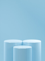 3 light summer blue podium tubes, 1 tube in front is lower than the 2 tubes in the back, light summer blue background, 3 vertical podiums