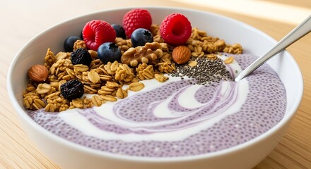Healthy breakfast bowl with yogurt granola berries and chia seeds