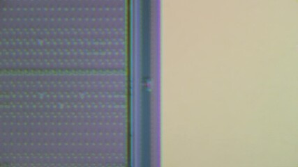 Microchip integrated circuit architecture under microscope