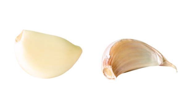 Side view set of two garlic cloves isolated with clipping path in png file format
