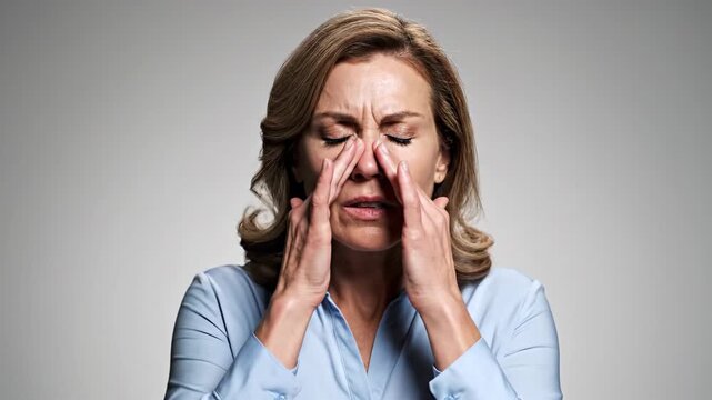 Woman Experiencing Pain: A Visual Depiction of Physical Discomfort and Facial Expressions