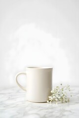 White mug with delicate flowers on a marble surface for a serene and calming feel