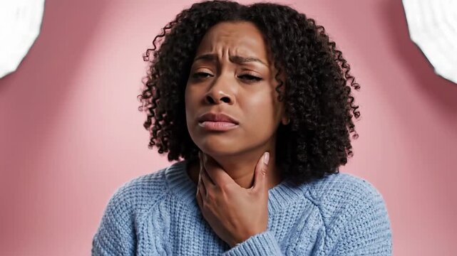Woman Experiencing Throat Pain Expresses Discomfort and Suffering in Studio