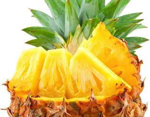 Close-up of a partially cut golden yellow tropical fruit with spiky green crown