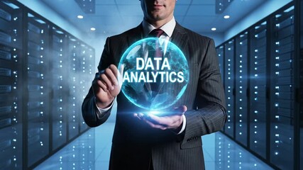 Man holds a Data Analytics hologram in a server room. This businessman in a suit works with Data Analytics. A man in a data center interacts with a virtual data hologram. Data Analytics and technology - Powered by Adobe