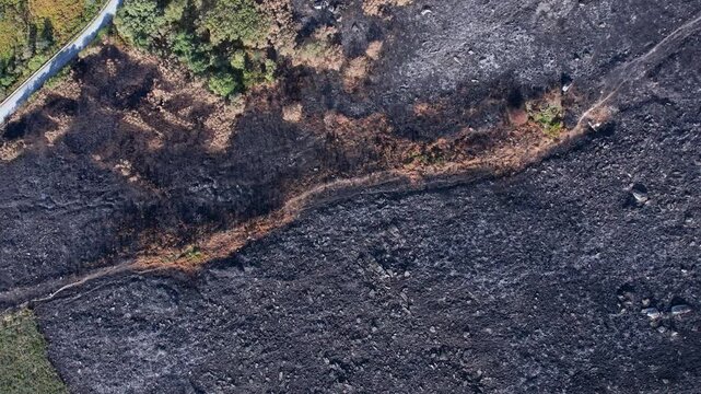 Top down view of burnt ground texture The Concept of Destruction