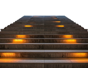 Stone staircase with embedded lighting leading upwards against a stark black background