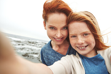 Selfie, mother or daughter with smile by beach for vacation, family time or picture for bonding memory. Outdoor, travel holiday or happy woman with kid for support, portrait or seaside trip together