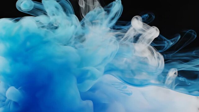 Slow motion macro shot of dynamic white and blue vapor blending and swirling with fluctuating levels of opacity and diffusion visual effect, swirling, future