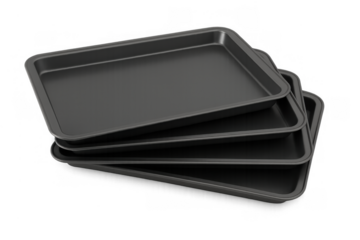 Black rectangular non-stick metal baking sheets for oven preparing food, stacked together, transparent background