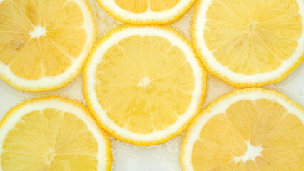 Fresh yellow lemon and soda.