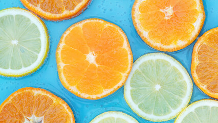 Fresh orange, yellow lemon, and soda.