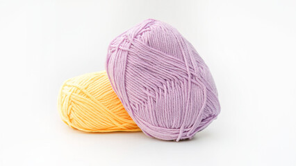 Colorful crochet yarn on a white background.