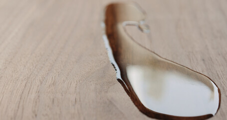 pour oil onto black walnut board