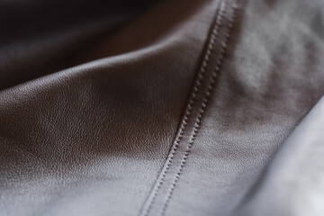 Closeup full grain gray brown leather clothes background