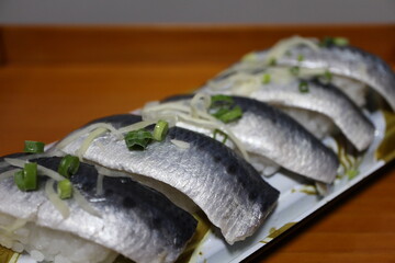 Vinegared sardine nigirizushi purchased at a supermarket in Tokyo, Japan