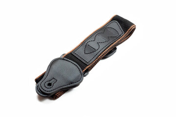 Black fabric strap for electric or acoustic guitar.