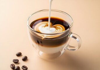 Pouring milk in a glass with espresso. Coffee art.