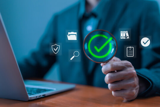 green check mark over a laptop, checklist review, verification process, symbolizing verification, approval, and digital document review. check of document, list survey, form business