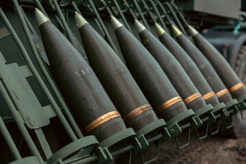 artillery shell 155 mm on combat vehicle platform. artillery shell on a combat vehicle