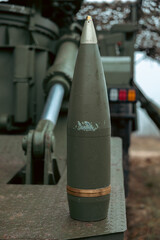 Obraz premium artillery shell on a combat vehicle 155mm