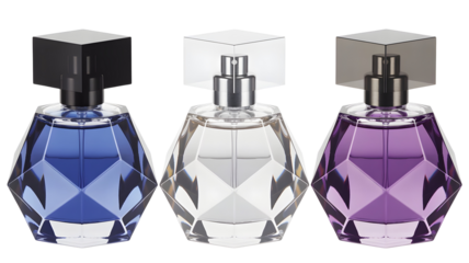 Set of three luxury faceted glass perfume spray bottles in blue, clear, and purple colors, isolated on transparent background