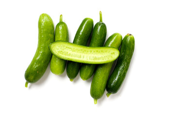 Fresh mini baby cucumbers on white background