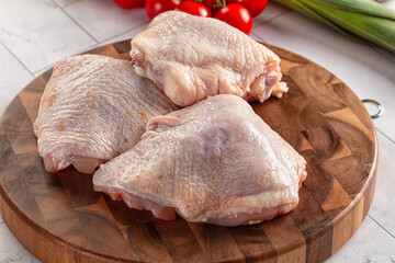 Raw chicken thighs for cooking
