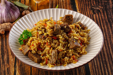 Asian traditional pilaf with beef