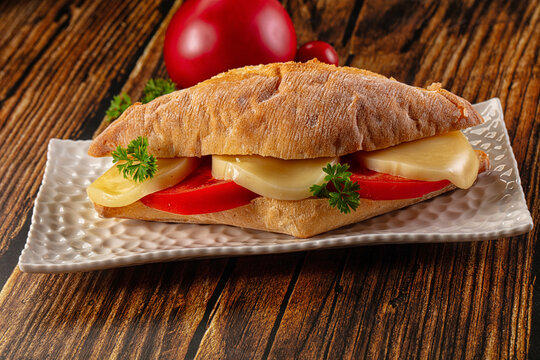 Sandwich with mozzarella and tomato