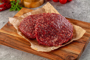 Raw beef burger cutlet for grill