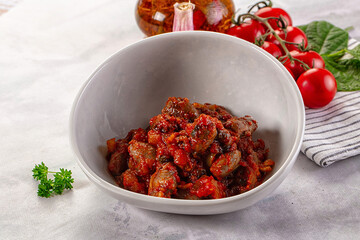 Roasted chicken hearts with vegetables