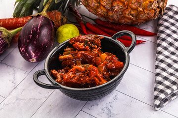 Asian cuisine - pork in chili sauce