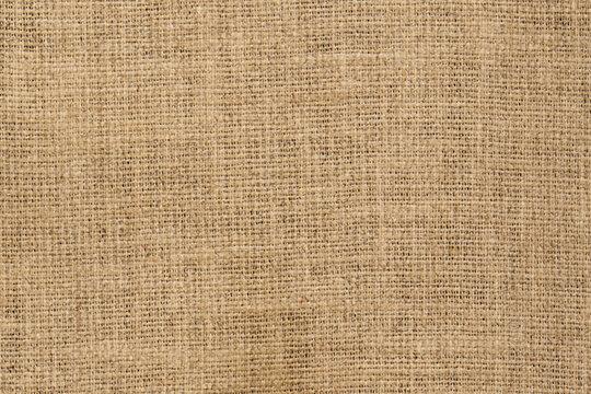 Natural Burlap Jute Fabric Texture Background with Rustic Brown and Beige Weave
