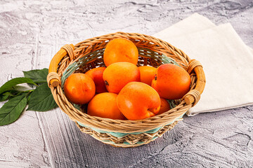 Raw ripe sweet apricots heap