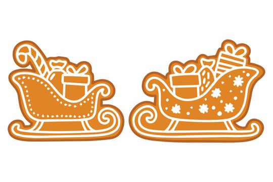 Pair of Santa sleigh biscuits. Glazed gingerbread sleds loaded with gift boxes and holiday surprises for Christmas greeting card or menu.