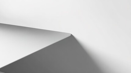 Fototapeta premium A clean white corner with a soft shadow creates a minimalist abstract background
