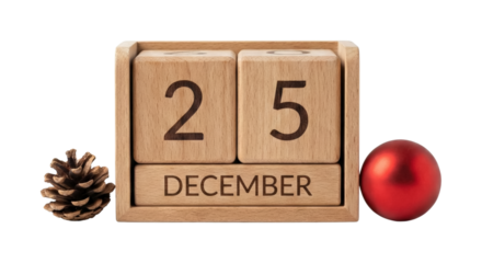 Wooden block calendar showing 25 December with pine cone and bauble