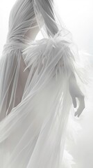 Elegant woman wearing luxurious white feather dress in Cloud Dancer tone. Color of the year 2026 bridal fashion concept. Ethereal haute couture style for wedding and luxury design projects.