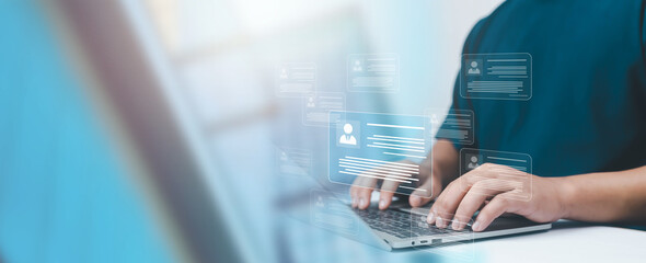 A person typing on a laptop with floating digital profile cards represents modern HR technology, online recruitment, data screening, and efficient candidate management in the Management, workplace.