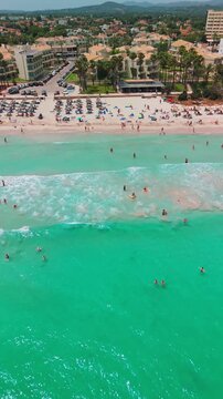 Aerial view of Platja de sa Coma beach in Mallorca, Balearic Islands, Spain.