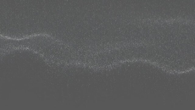 Subtly moving granular static texture creating a low frequency digital noise layer across a uniform mid-gray background in a seamless loop visual component, technical wallpaper, calm